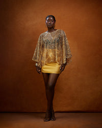 The Adaorah Blouse with an open front and butterfly sleeves by NALÈ