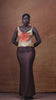 The Ifeoma Dress moving in NALÈ’s original sunset artwork print